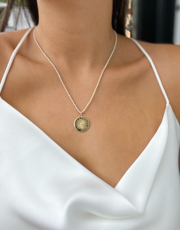 ESRA BURST DISC PENDANT NECKLACE
