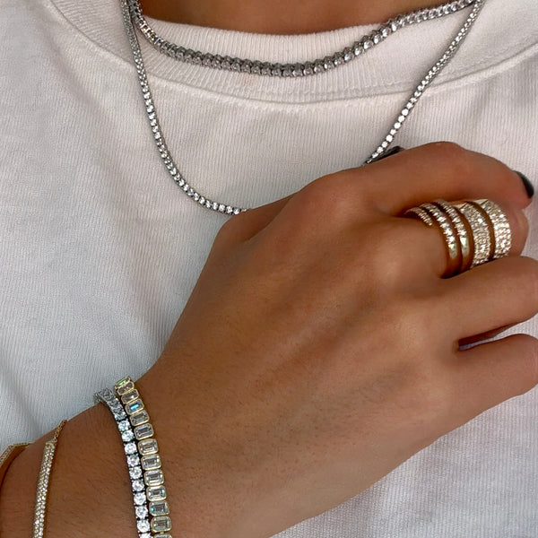 SHASHI EMERALD CUT BAGUETTE TENNIS BRACELET