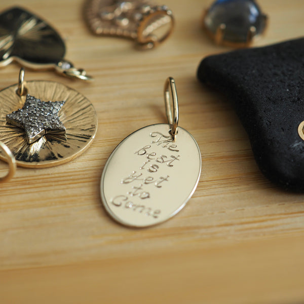 LOGAN OVAL 14K BURST DISC CHARM  - TWO SIDED