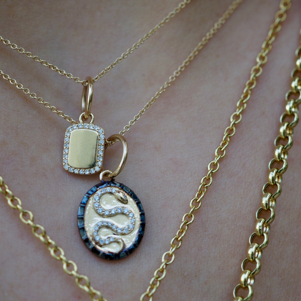 BECCA SNAKE OVAL CHARM
