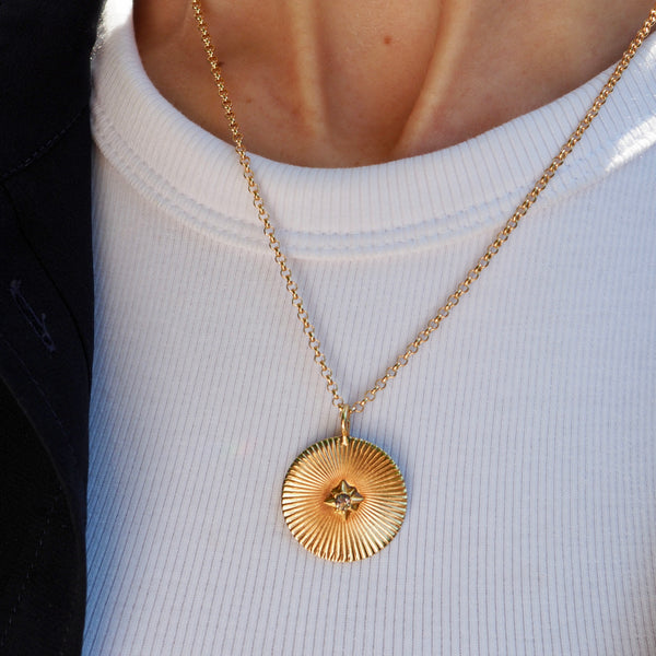 SUZEE FLUTED BURST  DISC NECKLACE
