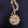 BRYCE ROLLED FLOWER  DISC NECKLACE