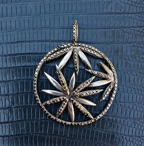 KALLIE TRIPLE FLOWER DISC  NECKLACE