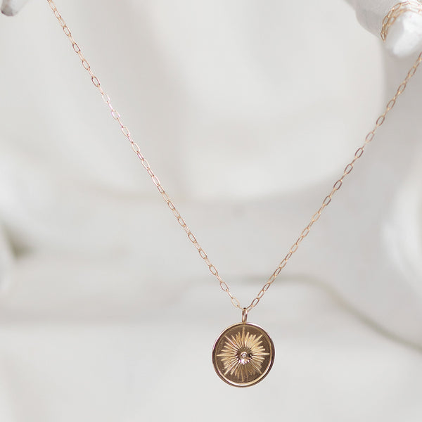 CARIE RAISED BURST DISC PENDANT NECKLACE
