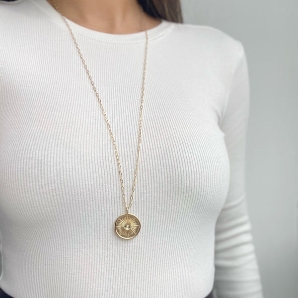 CARIE RAISED BURST DISC PENDANT NECKLACE